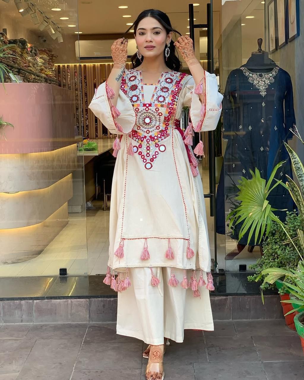 Shaajori Women Off-White Embroidered A-Line Kurta with Palazzos & Tassel Detailing